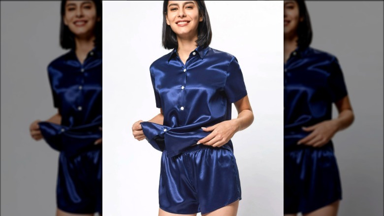 Model wearing blue silk pajama set