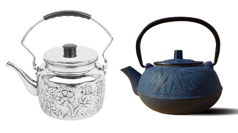 Silver embossed teapot and blue cast iron teapot