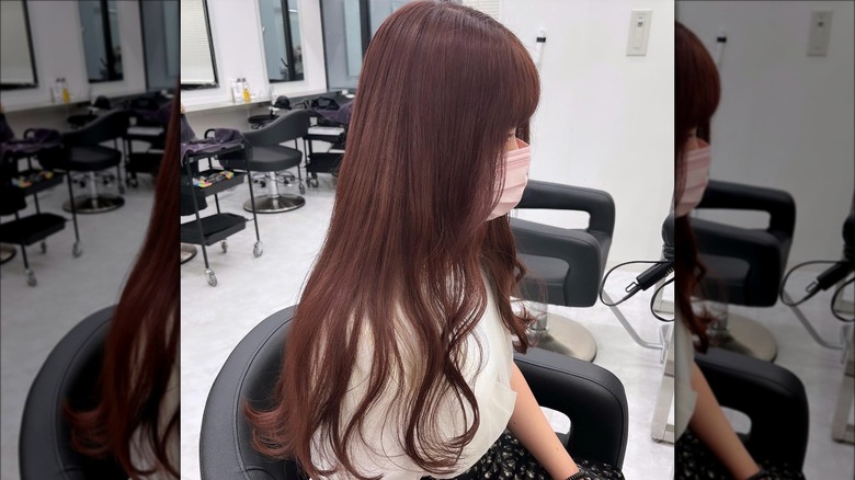 Side view of burgundy-brown hair