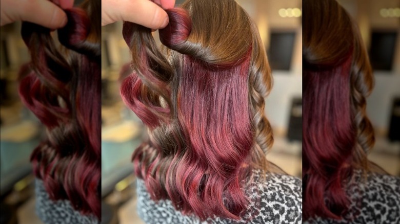 Hair with deep red streaks