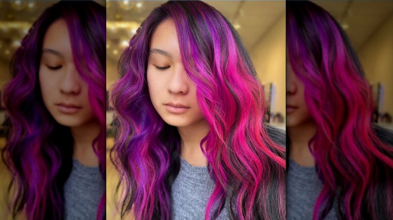 Person with long pink and purple hair