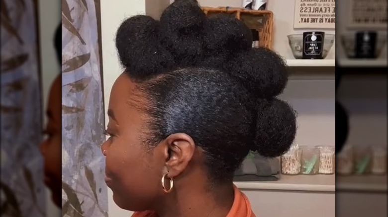 A pompadour hairstyle