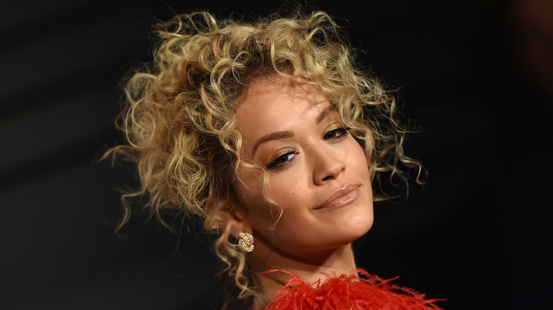 Rita Ora with a curly updo