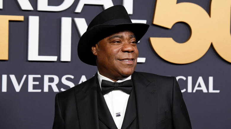 Tracy Morgan in a black hat and tux