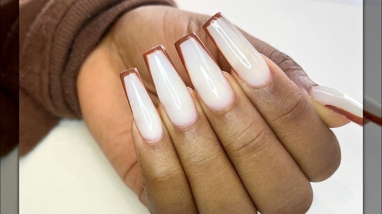 Square-shaped nails with brown tips