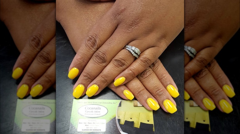 Dip powder nails bright yellow