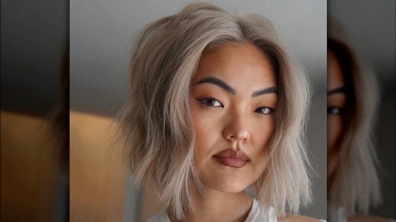 woman with bleached bob haircut