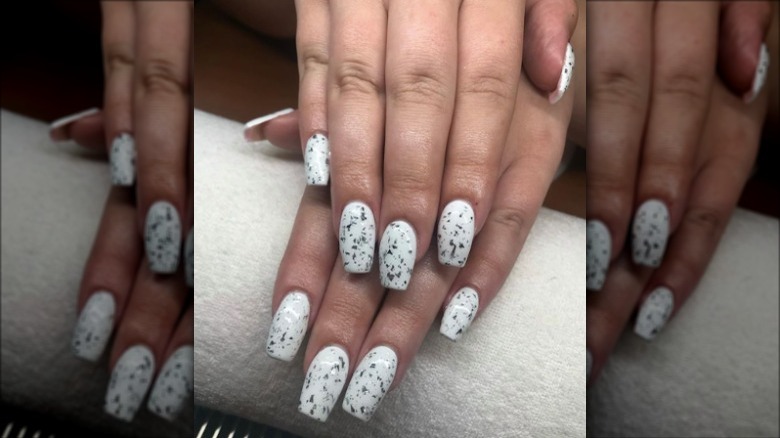 white nails with silver flakes