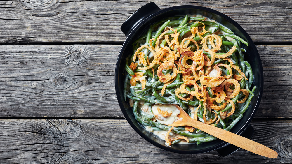 Green bean casserole on a wooden table top 