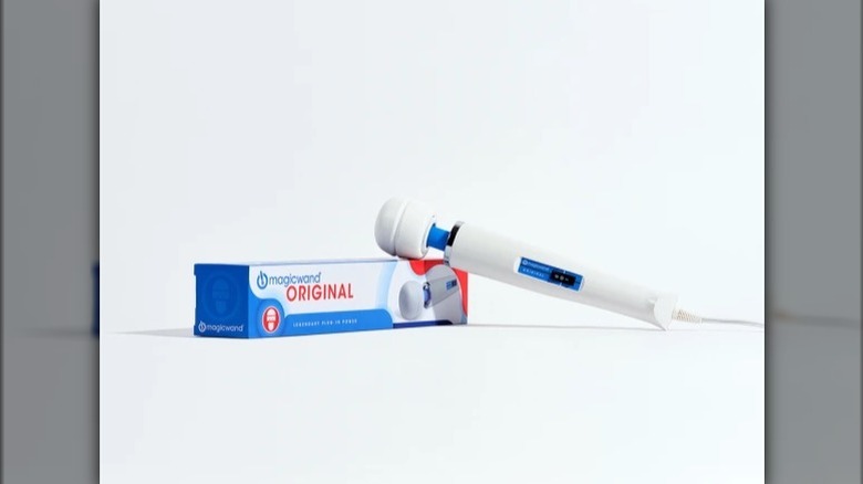 Magic Wand Original product next to its packaging