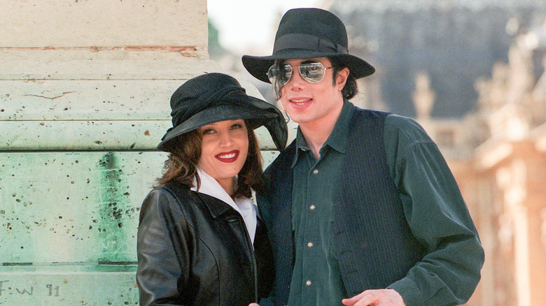 Lisa Marie Presley and Michael Jackson smile together