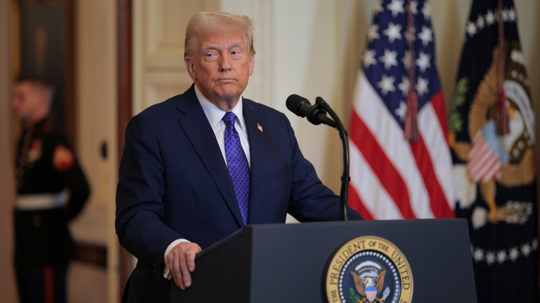 Donald Trump stands at the podium