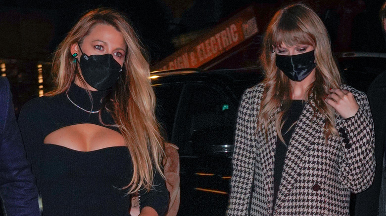 Blake Lively and Taylor Swift in masks