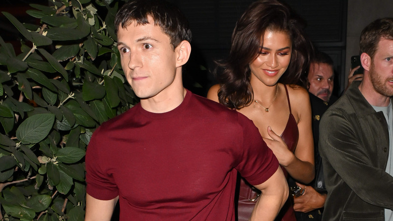 Tom Holland and Zendaya in matching outfits leaving Corner Bar