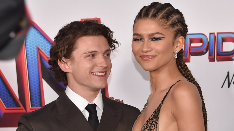 Tom Holland smiling at Zendaya