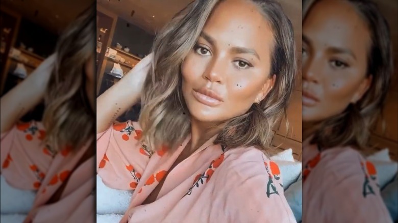 Chrissy Teigen taking a selfie