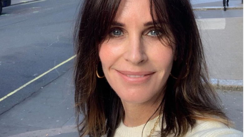 Courteney Cox smiling in London