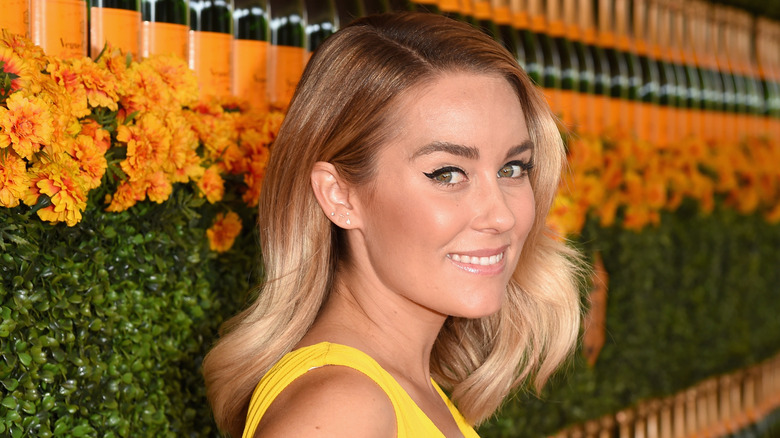 Lauren Conrad by wine, flowers