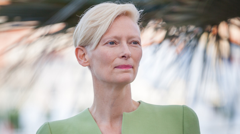 Tilda Swinton wearing green suit