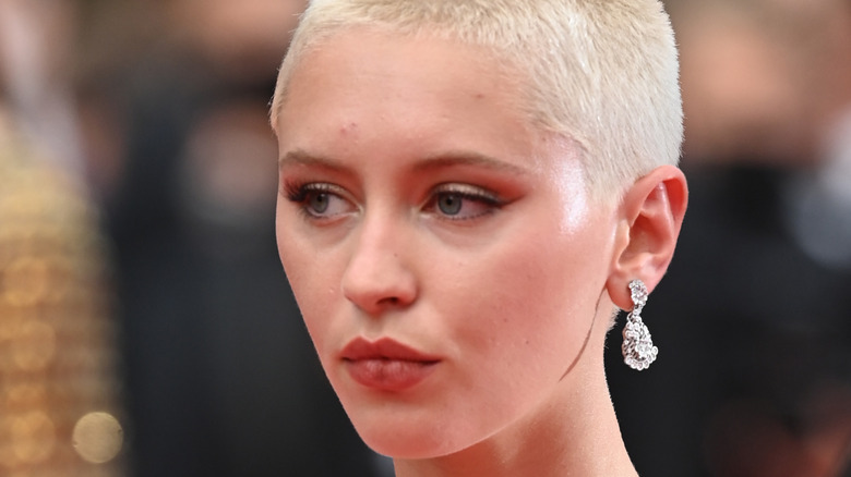 Iris Law with a buzz cut