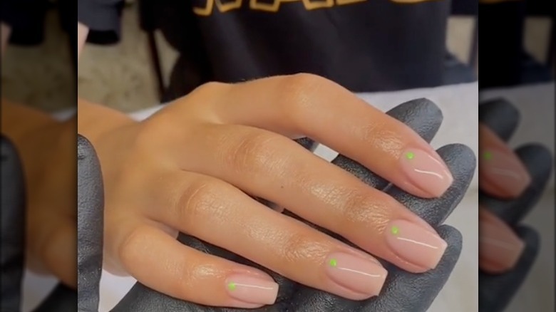 Simple manicure with neon dot