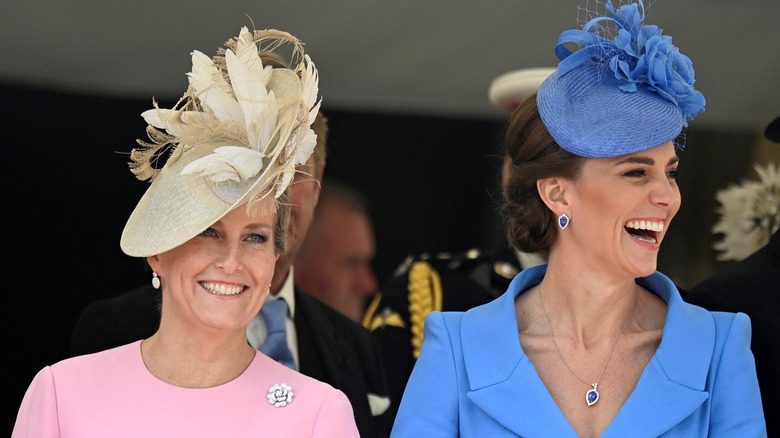 Sophie and Kate smiling in fascinators