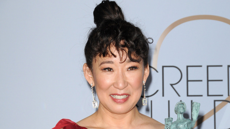 Sandra Oh with curly bangs