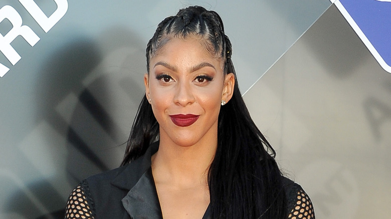 Candace Parker with high half ponytail