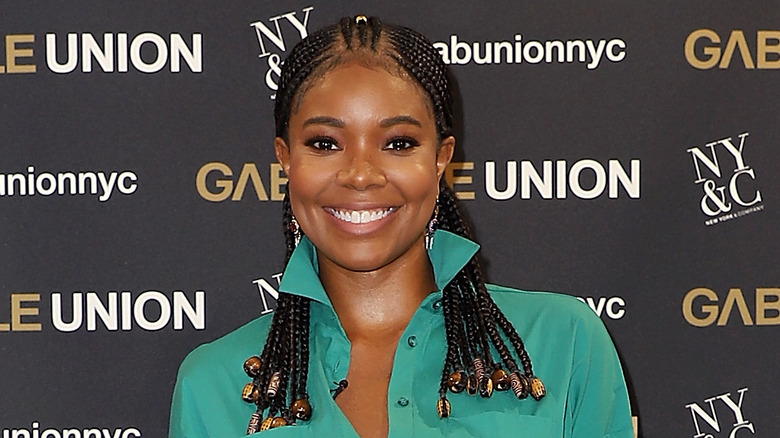 Gabrielle Union wearing green shirt