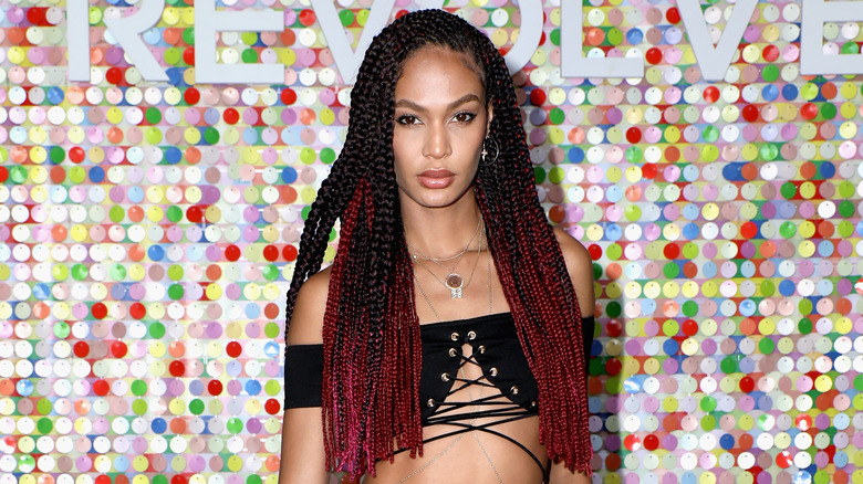 Joan Smalls with red braids