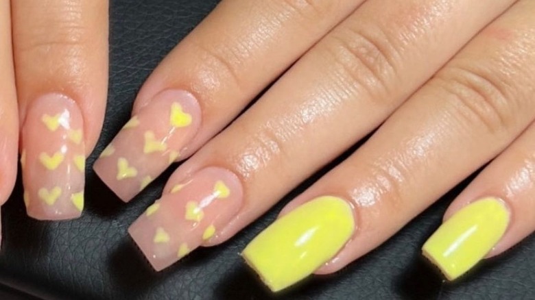 Yellow heart manicure