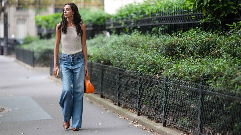 Woman wearing straight leg jeans