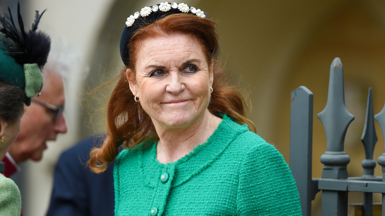 Sarah Ferguson smiling in green suit