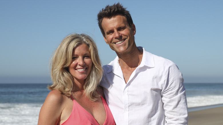 Carly and Drew smiling on the beach