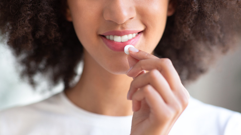 A woman taking antidepressants