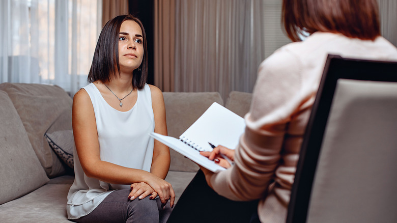 Woman talks with a counselor/therapist 