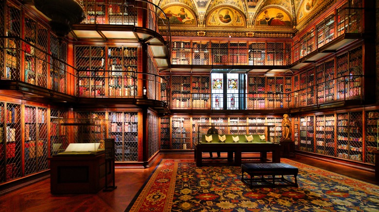 three-story book display inside morgan library