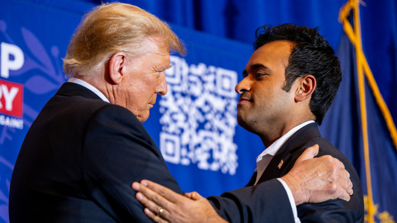 President Donald Trump greets U.S. entrepreneur Vivek Ramaswamy