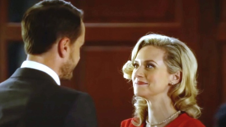 Hilarie Burton smiling at Paul Campbell