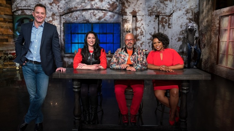 The host and judges of Haunted Gingerbread Showdown