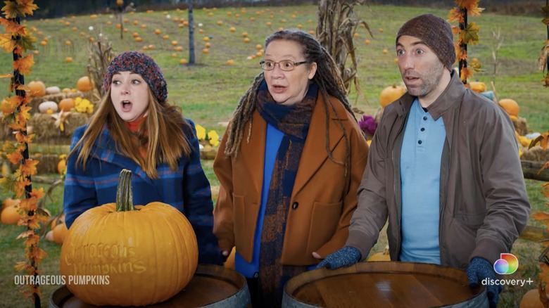 Alyson Hannigan and two contestants in Outrageous Pumpkins