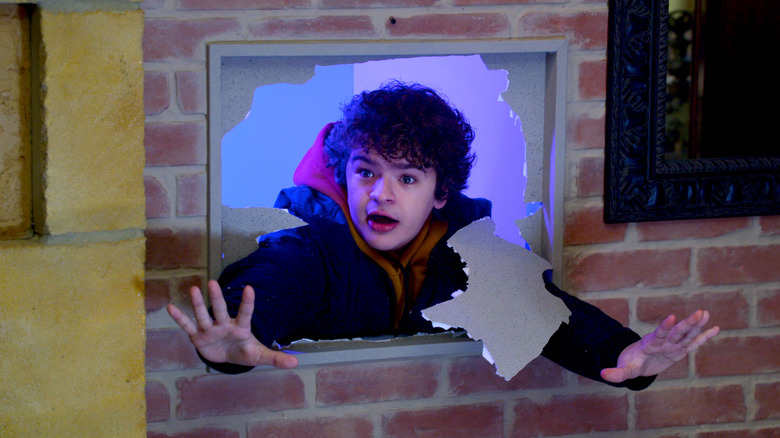 Gaten Matarazzo popping through the wall