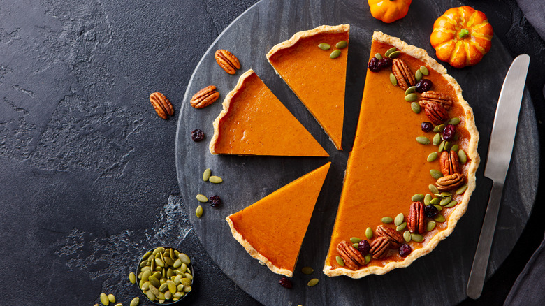 pumpkin pie on a cutting board