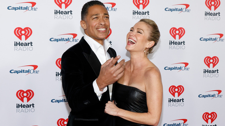 T.J. Holmes and Amy Robach on the red carpet at the 2023 iHeartRadio Jingle Ball