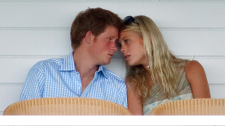 Prince Harry and Chelsy Davy touching faces