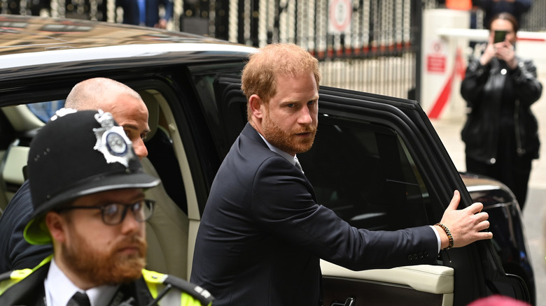 Closeup of Prince Harry looking sad