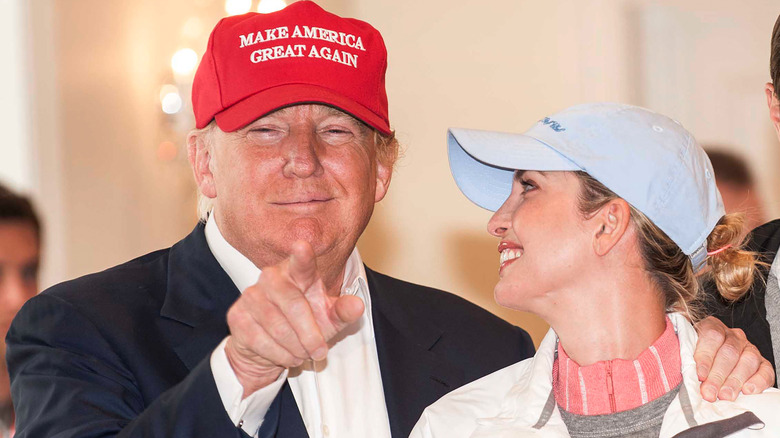 Ivanka smiles at Donald as he puts a hand on her shoulder