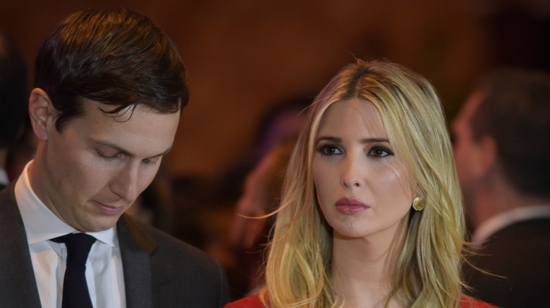 Ivanka looking angry with Jared looking away