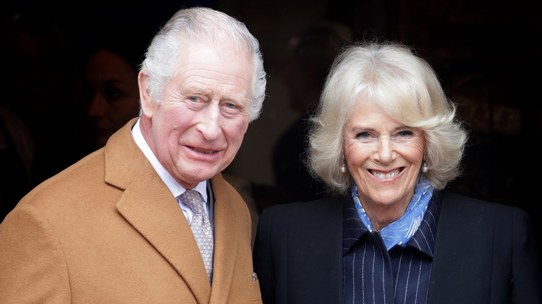 King Charles and Queen Camilla smiling