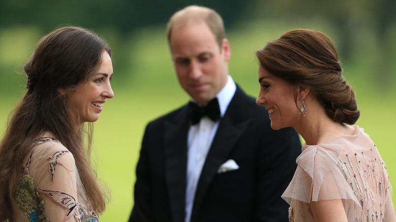 Prince William and Princess Catherine are greeted by Rose Cholmondeley, the Marchioness of Cholmondeley at a gala dinner in King's Lynn, England (2016)